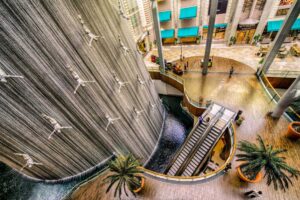 Shoppers enjoying The Dubai Mall during a Dubai city shopping tour experience.