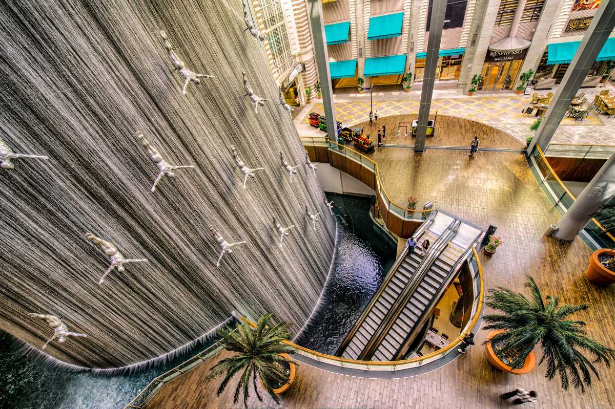 Shoppers enjoying The Dubai Mall during a Dubai city shopping tour experience.